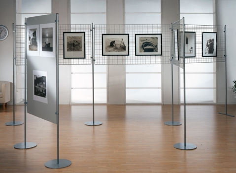 Griglie espositive autoportanti con basi tonde